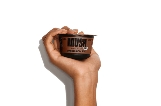 mush dark chocolate product held in hand