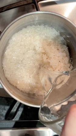 transfer rice to saucepan and add water