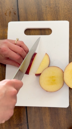 Slice your apple into thin, half moon slices