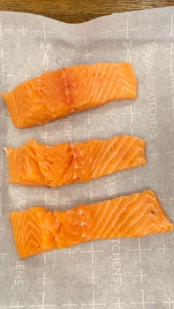 prep salmon filets on prepared baking sheet (we recommend using parchment paper)