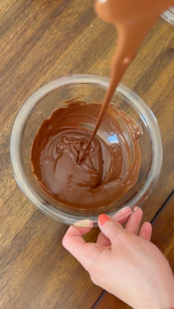 Melt chocolate until smooth. Melt in a microwave-safe glass bowl in 30 seconds increments, stirring well each time. Be cautious not to burn.