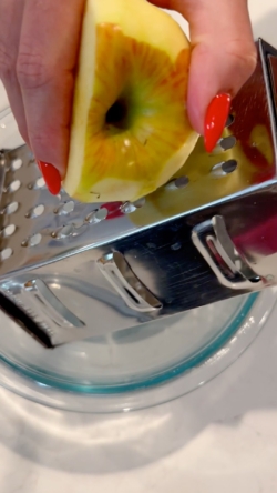 While this is blending, peel and grate ½ of an apple