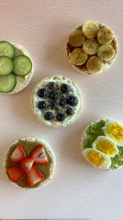 Top each rice cake with topping combinations.
