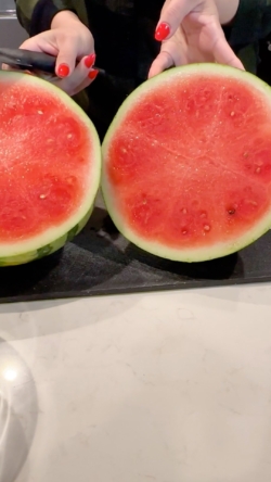Cut a mini watermelon in half or a large watermelon in quarters