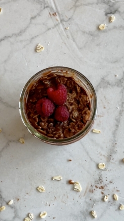 chocolate oats topped with raspberries