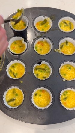adding eg mixture into muffin liners
