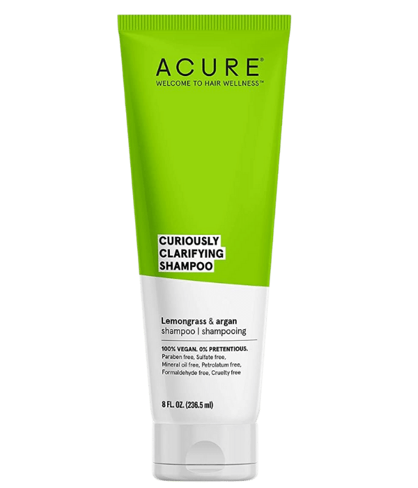 A tube of ACURE Curiously Clarifying Shampoo against a blank background