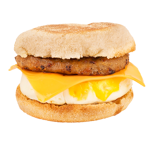 A breakfast sandwich made with egg, cheese, and a meat patty between two halves of an English muffin