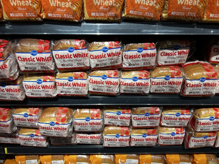 White bread on the shelf at a grocery store. 