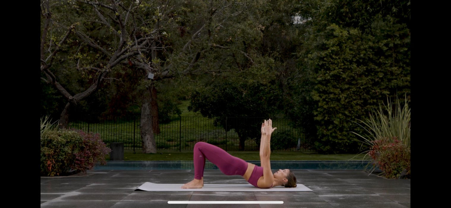 A screenshot of a video of a pilates class on the Alo Moves app.